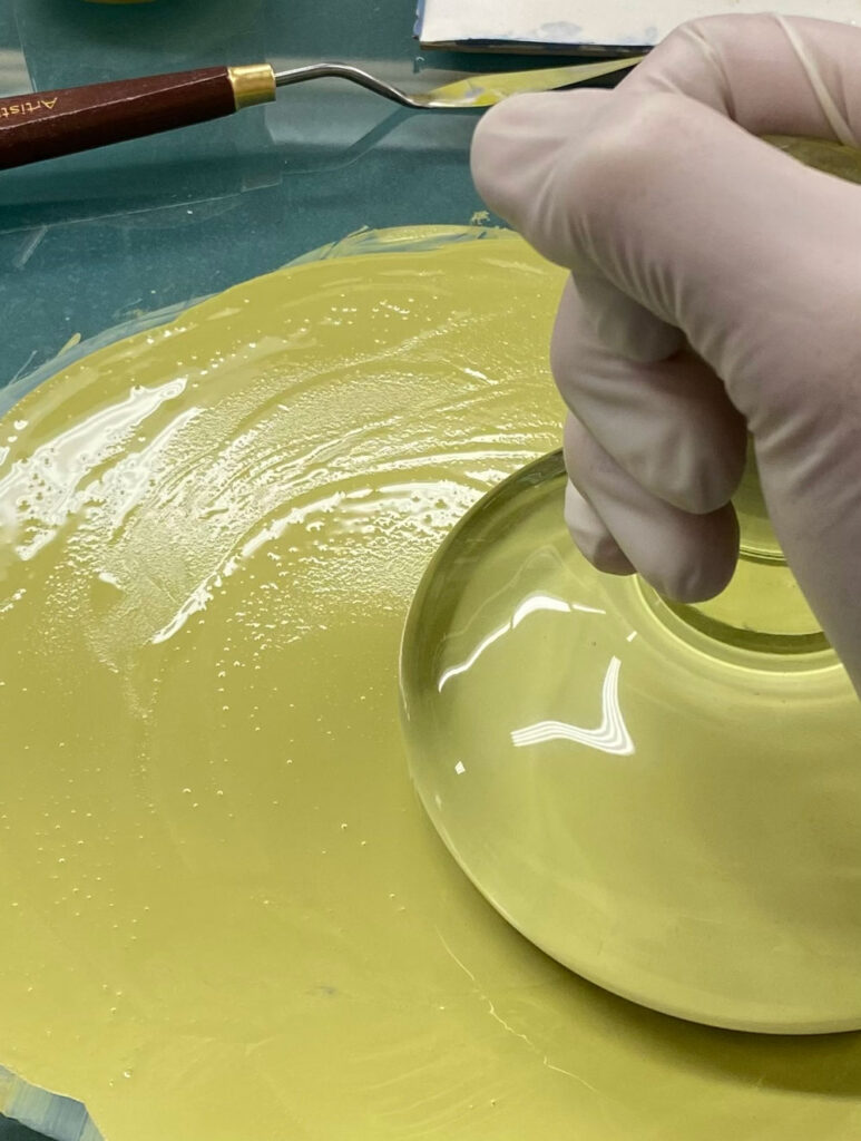 Yellow tantric pigment being prepared